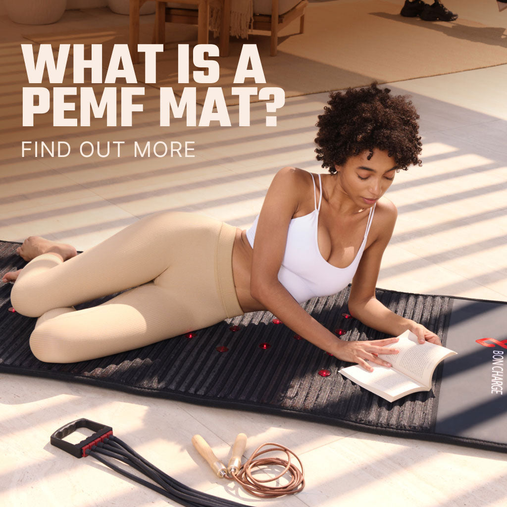 Woman Lounging On PEMF Mat Reading