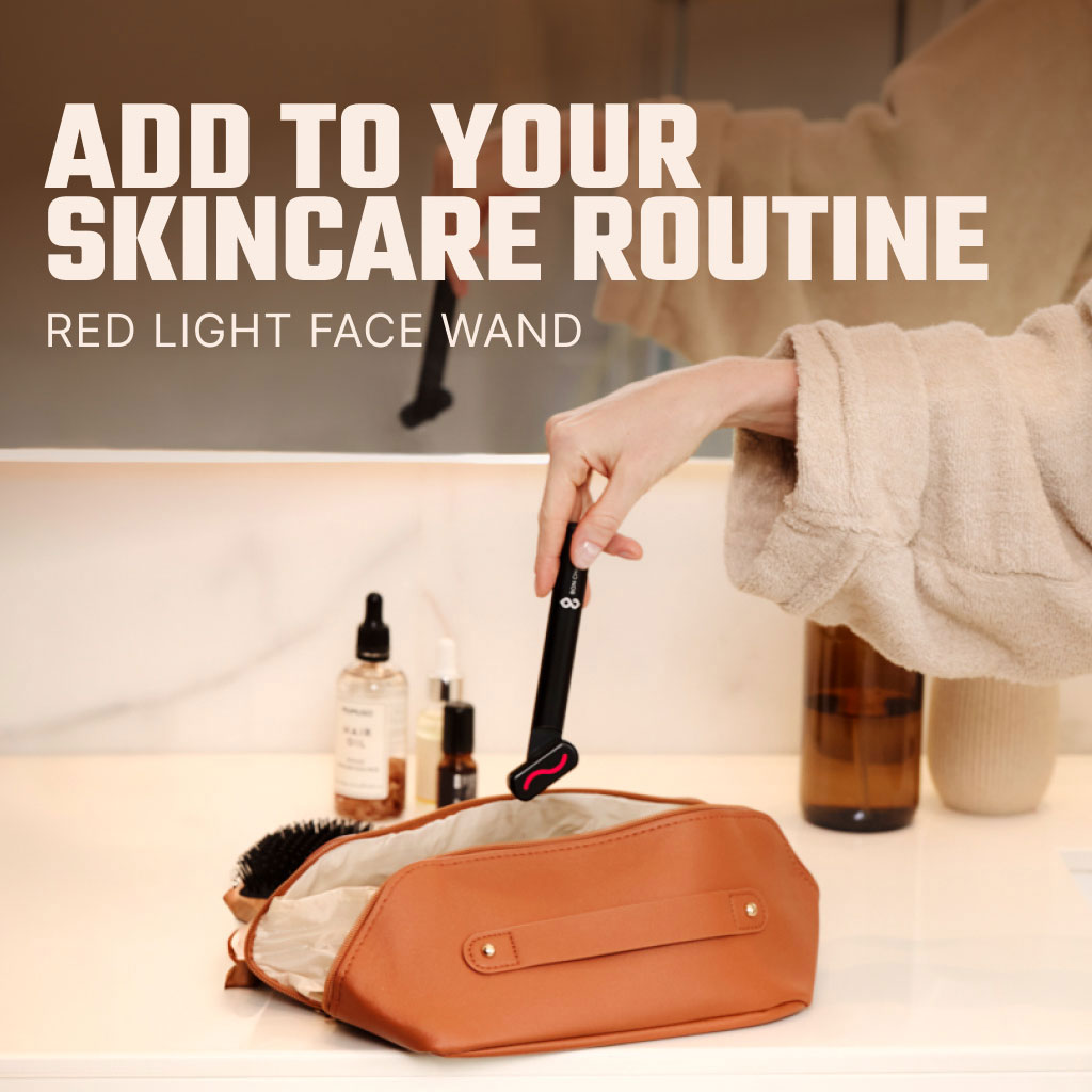 Woman In Bathroom Placing Face Wand Back Into Pouch